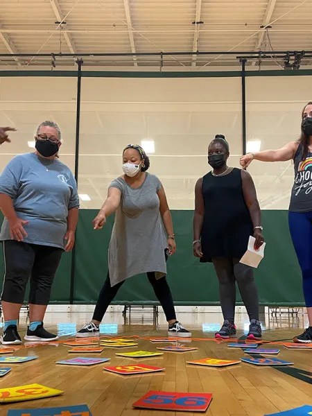 People participating in a team building exercise